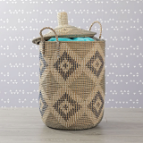 Seagrass laundry basket with cloth inside
